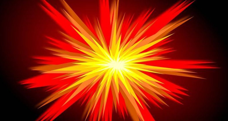 Bljesak zute svetlosti u narandzastoj svetlosti na crnoj podlozi