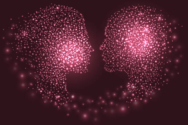 Profili muskarca i zene koji se gledaju sacinjen od tackica svetlosti